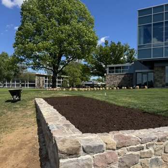 Stone raised garden bed showing Constanza craftsmanship