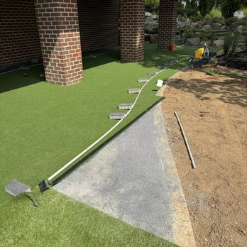 Well-maintained residential lawn and landscape